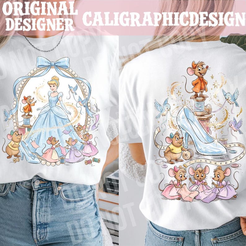 May include: White t-shirt featuring a Cinderella-themed design. The front shows Cinderella in a blue gown, surrounded by mice and a decorative frame. The back displays a glass slipper, mice, and sewing elements. Text at the top reads "ORIGINAL DESIGNER CALIGRAPHICDESIGN".