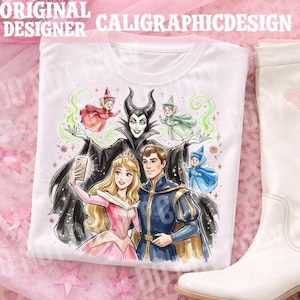 May include: White t-shirt with a vibrant illustration of Disney characters, including Aurora, Prince Phillip, and Maleficent, posing for a selfie. The text "ORIGINAL DESIGNER CALIGRAPHICDESIGN" is printed at the top.