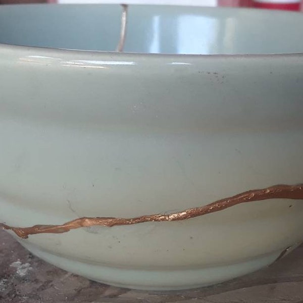 Kintsugi Kintsukuroi ceramic bowl.