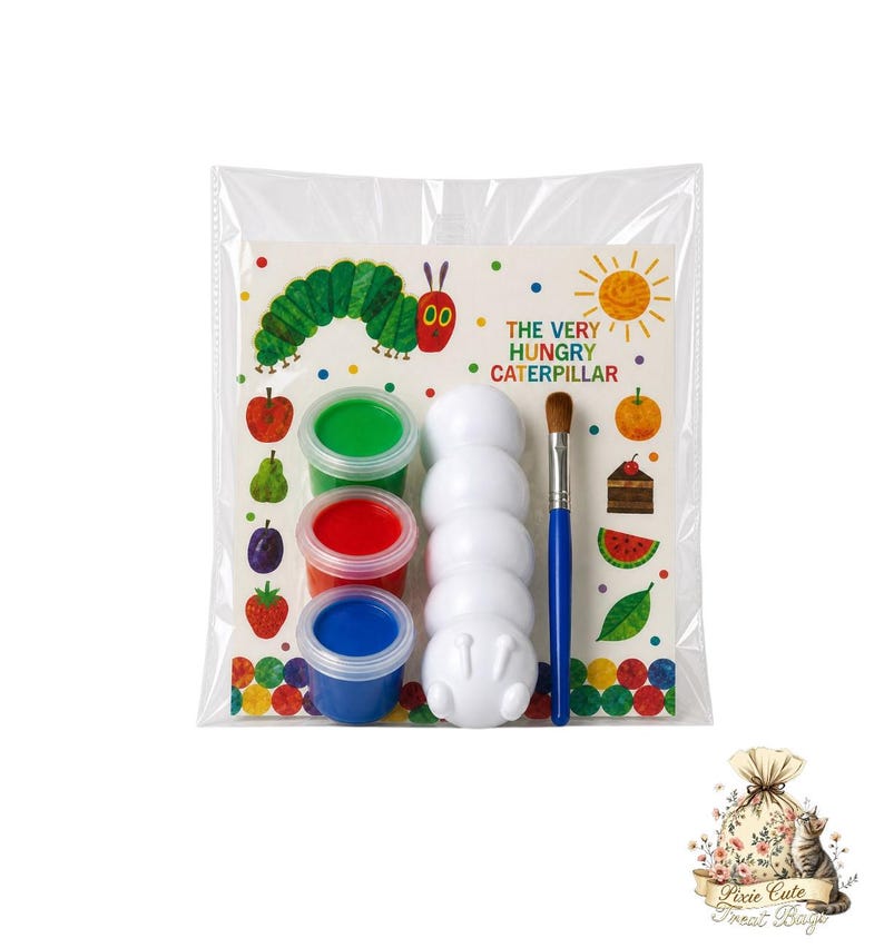 May include: A clear plastic bag contains a children's art kit. The kit includes three small paint pots in green, red, and blue, a white caterpillar-shaped item, a paintbrush, and a colorful illustration of a caterpillar with the text "THE VERY HUNGRY CATERPILLAR."