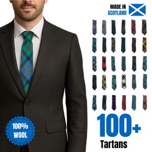 May include: A man in a dark suit wearing a green, blue, and yellow plaid tie. The image shows a selection of tartan ties, with the text "100+ Tartans" and "Made in Scotland". A badge reads "100% Wool".