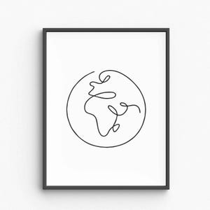 May include: A framed print featuring a minimalist line drawing of the Earth. The black artwork is a continuous line within a circle, depicting the continents. The frame is black, and the background is white.