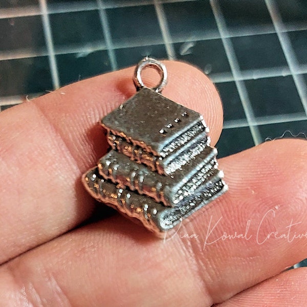 Stack of books charm - silver tone