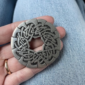 st Justin Celtic brooch