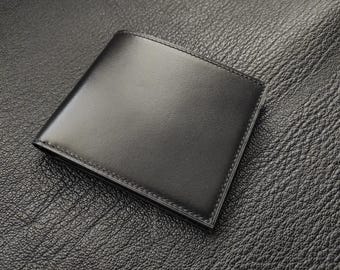 Handgefertigte Brieftasche aus schwarzem Leder: Schlank, Langlebig, Zeitlos
