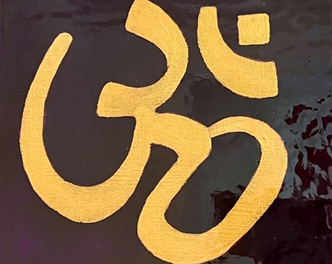Om in Gold on Purple