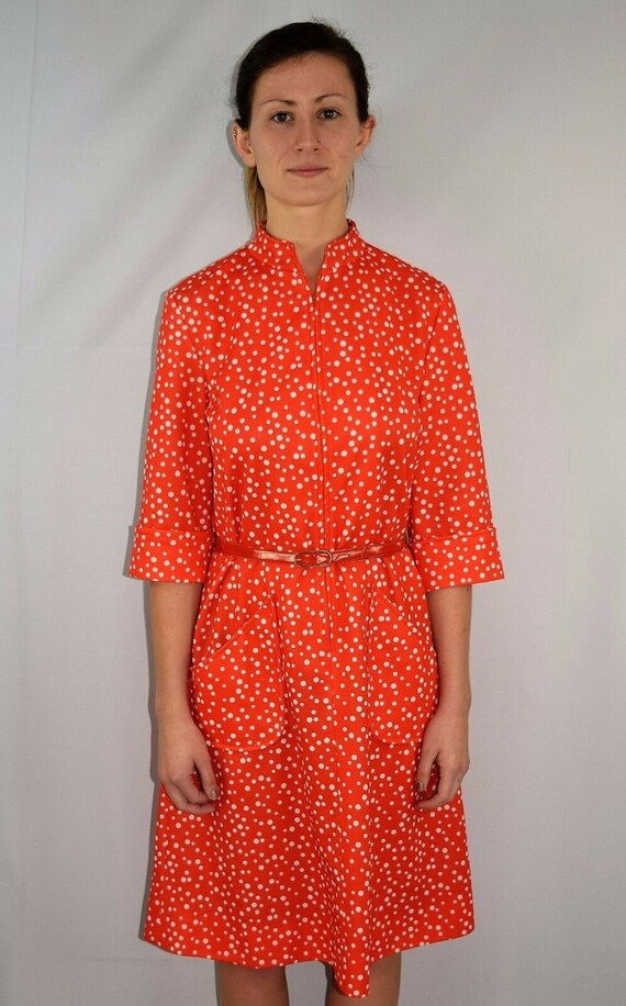 orange and white polka dot dress