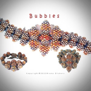 May include: A set of three beaded jewelry pieces in a gold, brown, and black color scheme. The pieces are a necklace, a bracelet, and a ring. The necklace is a long, flowing piece with a central diamond-shaped cluster of beads. The bracelet and ring are both simple, circular pieces.