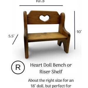 May include: A small wooden bench with a heart-shaped cutout in the backrest. The bench features a medium brown wood grain finish. Dimensions are clearly marked as 10.5 inches in width, 10 inches in height, and 5.5 inches in seat depth.