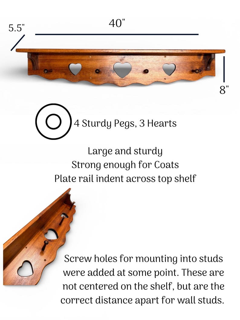 May include: A brown wooden wall shelf featuring three heart-shaped cutouts and four pegs. The shelf measures 40 inches wide, 8 inches high, and 5.5 inches deep. It includes a plate rail indent on the top surface and off-center mounting holes.