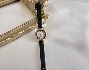 Reloj ovalado de cuero negro: elegante reloj dorado para mujer, regalo para el Día de la Madre.