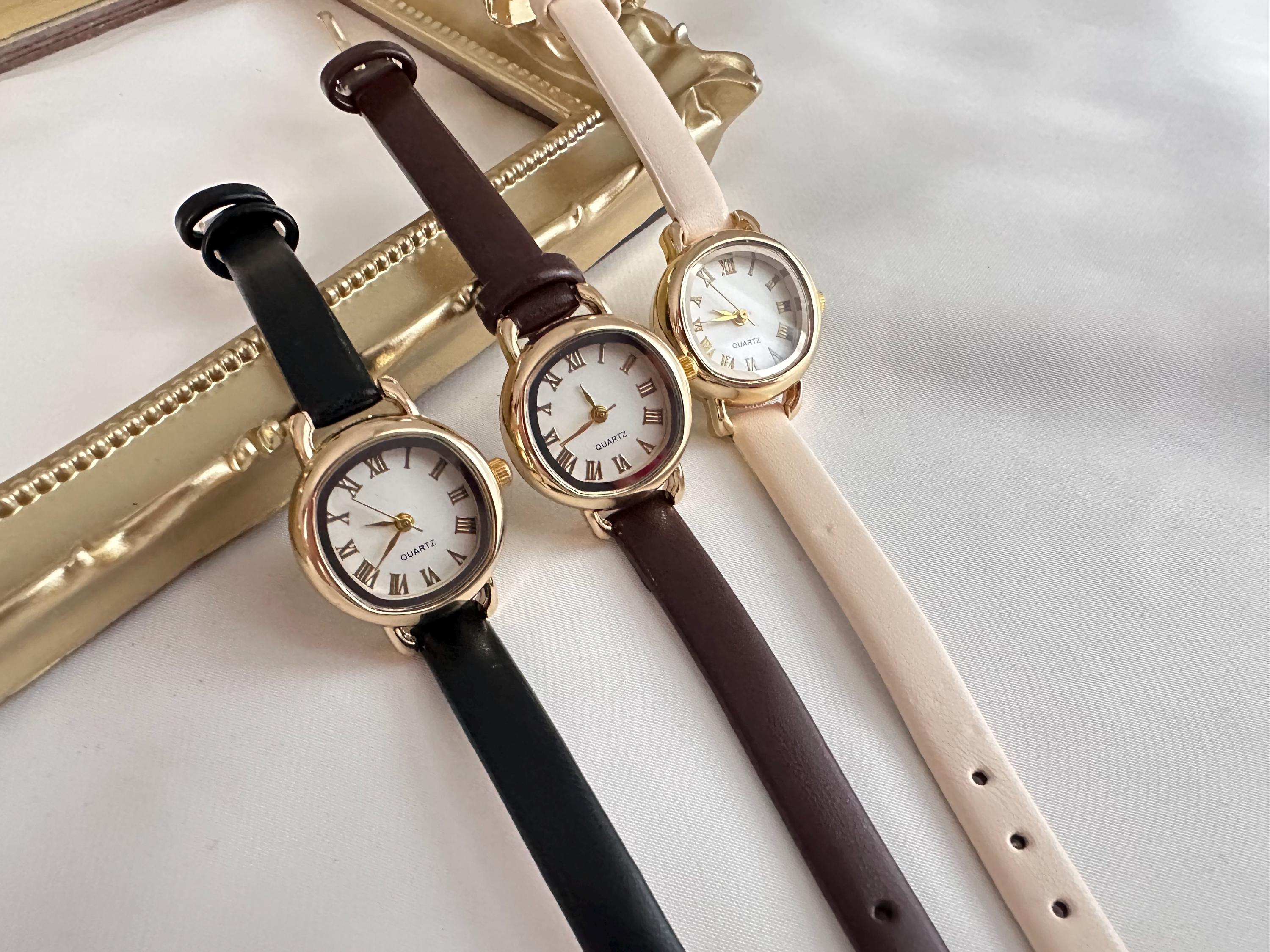 Black Leather Oval Watch – Gold Women