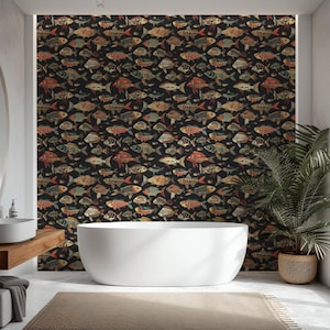 May include: A contemporary bathroom featuring a white bathtub, a wooden vanity with a circular mirror, and wallpaper adorned with colourful fish on a black backdrop. A potted plant is near a large window.