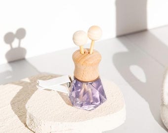 Diffuseur à clip pour voiture : parfums boisés et terreux, arôme naturel de longue durée