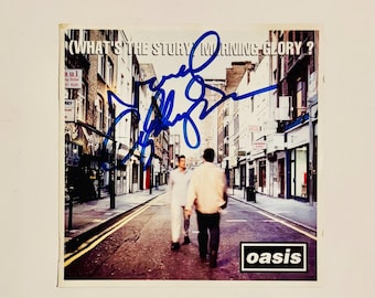 ノエル・ギャラガー直筆サイン入り写真 - オアシス - 11インチ×14