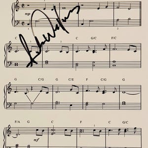 Nuty z autografem Johna Williamsa i certyfikatem autentyczności dołączonym do utworu