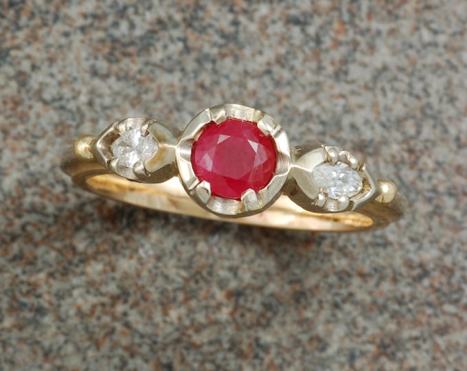 Ruby and diamond ring | 14 karat yellow and white gold | unique