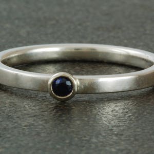 September birthstone ring, natural sapphire; sterling silver ring available with white or yellow gold bezel; stacking.