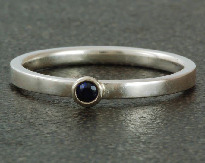 September birthstone ring, natural sapphire; sterling silver ring available with white or yellow gold bezel; stacking.
