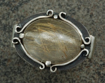 Sterling silver ring with rutilated quartz