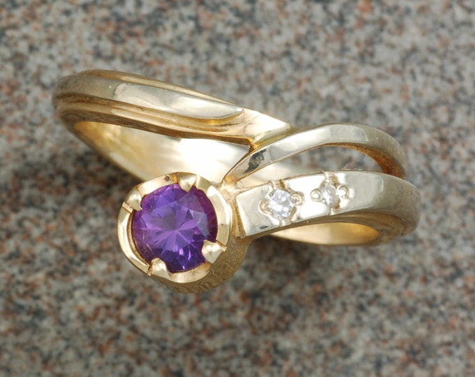 Amethyst and diamond ring | wrap around style | 14 karat yellow and white gold | unique