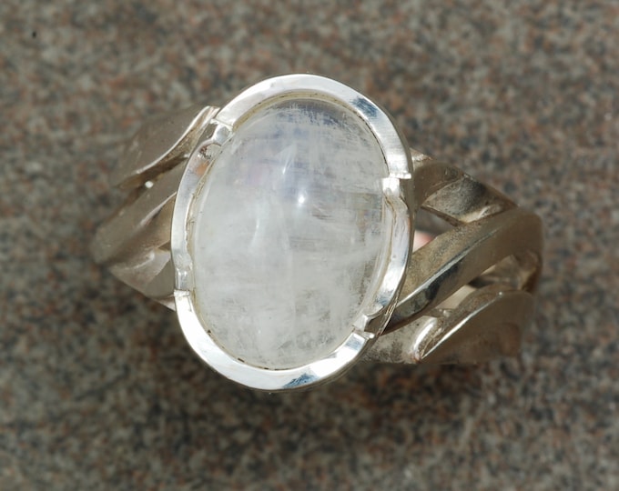 Sterling silver ring set with oval moonstone.