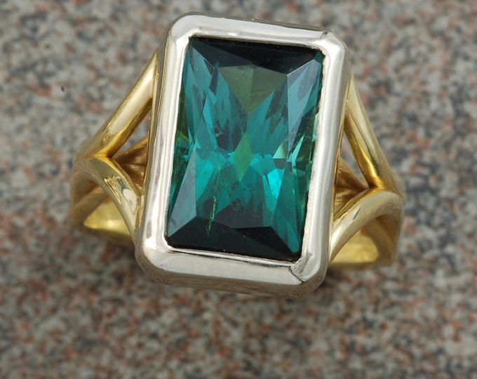 Tourmaline ring designed in a 14 karat white and 18 karat yellow gold.