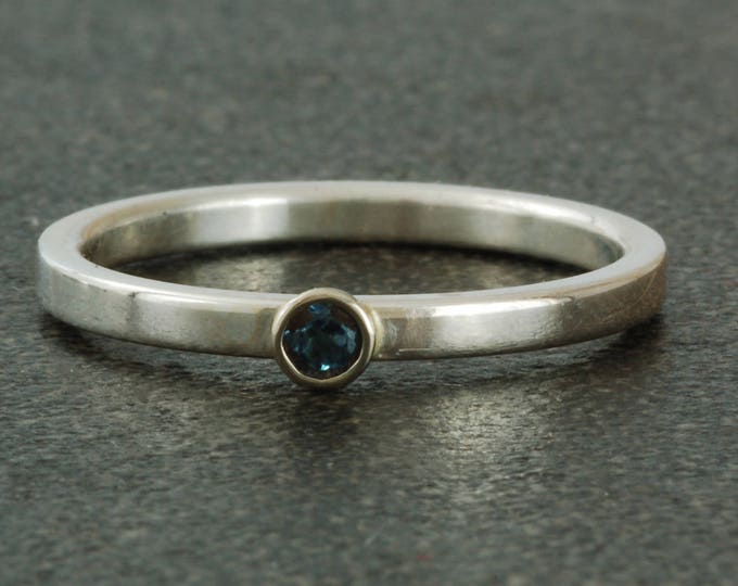 December birthstone ring, natural blue Zircon.  Sterling silver ring available with white or yellow gold bezel, stacking.