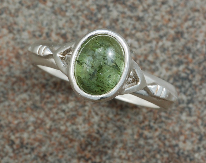 Sterling silver ring set with green tourmaline.