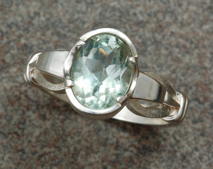 Sterling silver "shepherds hook" ring set with green amethyst.