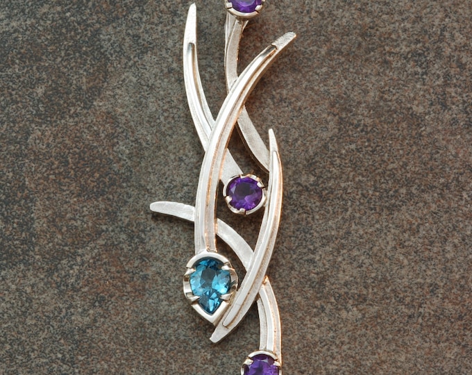 Sterling silver topaz and amethyst pendant