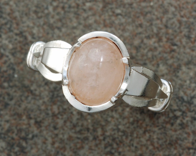 Sterling silver ring set with morganite cabochon.