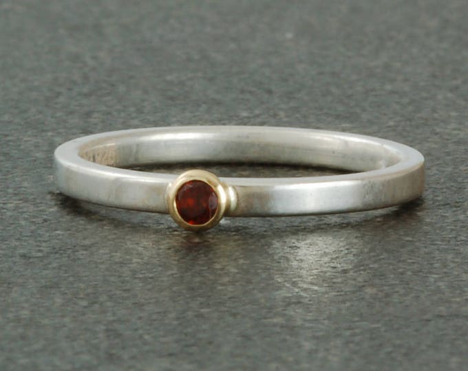 January birthstone ring, genuine garnet. Sterling silver ring available with white or yellow gold bezel. Stacking