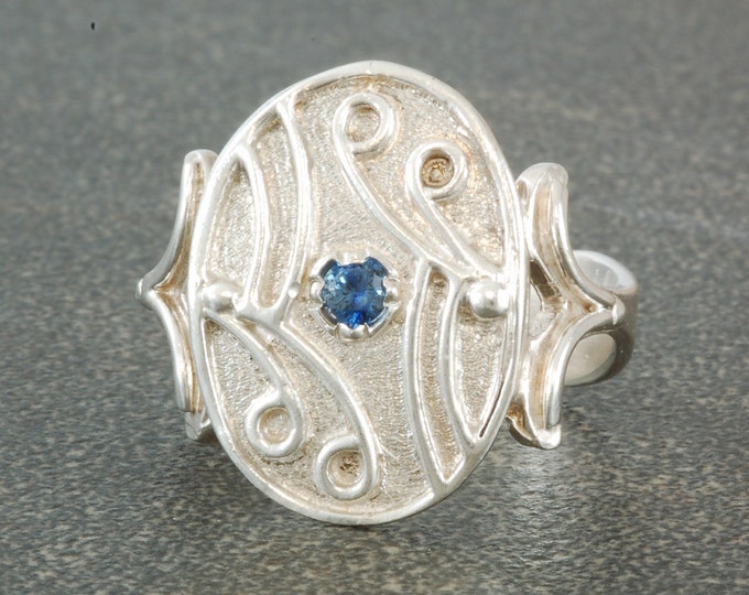 Antique scroll style ring with sapphire | unique