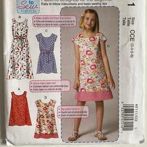 May include: A set of three ceramic mugs with a speckled, matte finish. The mugs are in shades of cream, light gray, and dark gray. Each mug has a simple, minimalist design and a rounded handle.