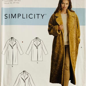May include: A Simplicity sewing pattern envelope R10716 featuring a long, textured mustard-yellow coat. The package displays technical line drawings for four coat variations labeled A, B, C, and D, with size information for U.S. sizes XS through XL.