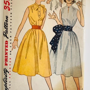 May include: A vintage Simplicity sewing pattern envelope 4293, size 18, bust 36. The illustration features two sleeveless dresses with high collars and full skirts. One dress is yellow with a red belt, and the other is light blue with a dark blue polka dot sash.