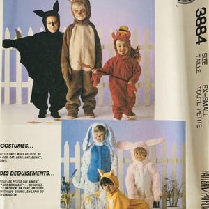 May include: A sewing pattern envelope labeled 3884 for children's costumes including a black bat, brown bear, red devil, blue and white spotted bunny, pink bunny, and yellow cat. The cover features illustrations of children wearing these plush outfits.