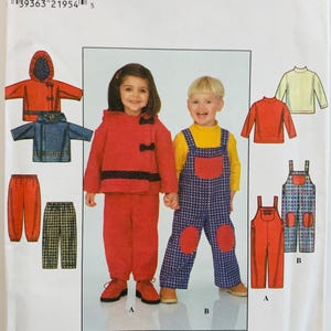 May include: Simplicity sewing pattern for children's clothing. The pattern includes options for a red coat and pants set, blue overalls with red patches, and other tops and bottoms. The pattern is for sizes 2, 3, and 4.