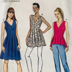 May include: Illustration of three sleeveless tops and a dress. The tops include a pink peplum top, a white floral top, and a blue dress. The text at the top reads "Dress to Top Options".