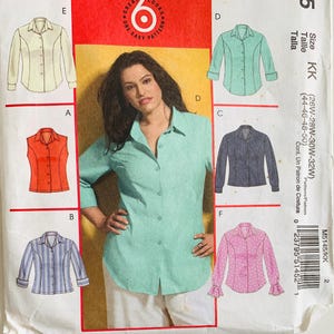 May include: A sewing pattern package featuring six shirt styles. The main image shows a woman wearing a light green button-down shirt. Other shirt styles include a sleeveless orange top, a striped shirt, and a pink polka dot shirt with ruffled sleeves.