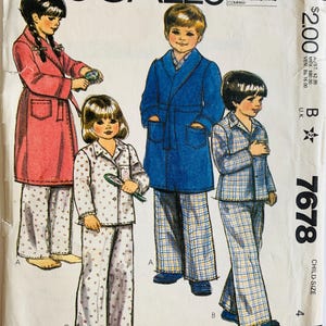 May include: Vintage McCall's sewing pattern for children's sleepwear. The pattern features illustrations of children in pajamas and robes. The cover has the McCall's logo and pattern number 7678.