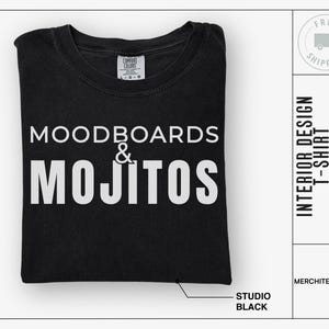 May include: Black t-shirt with white text that reads "Moodboards & Mojitos".