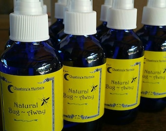 May include: Four blue glass bottles with white spray tops and yellow labels. The labels read "Cheshire's Herbals" and "Natural Bug~Away" with a small image of a mosquito. Each bottle contains 4 oz of liquid.