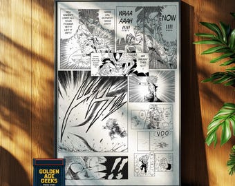 May include: Black and white framed comic book art print featuring panels from a manga. The print includes action scenes with characters and speech bubbles. A small retro arcade game is in the foreground with the text "GOLDEN AGE GEEKS PRESS START".