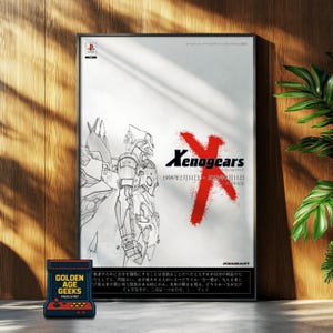 May include: A framed poster for the game "Xenogears" with a red "X" and a mech sketch. The poster is displayed with a retro arcade game console that reads "Golden Age Geeks". The poster is in a black frame.