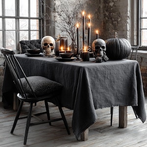 Black Linen Gothic Halloween Tablecloth
Transform your Halloween celebration into an affair with our black linen gothic Halloween tablecloth. Crafted from 100% pure linen, this tablecloth combines natural sophistication with an eerie, mystical charm. It will instantly conjure an atmosphere of gothic allure and Halloween mystery in your home, making it perfect for your dining table, festive banquets, and special seasonal gatherings.
Available in large, rectangle, and long sizes. Custom orders