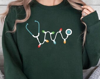 Stethoscope Christmas Sweatshirt,Stethoscope Christmas Lights Sweatshirt,Nurse Sweatshirts,Medical Xmas Sweater,Nurse Gift,Healthcare Worker