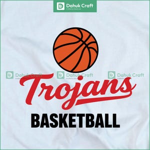 May include: White t-shirt featuring a basketball graphic. The design includes an orange basketball with black lines, the word "Trojans" in red script, and the word "BASKETBALL" in black block letters.