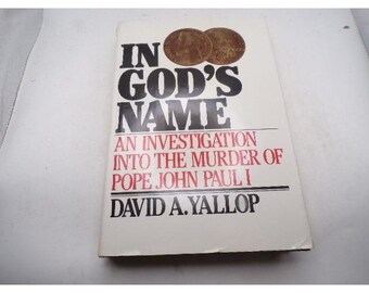 May include: A book titled "IN GOD'S NAME" with the subtitle "AN INVESTIGATION INTO THE MURDER OF POPE JOHN PAUL I" by David A. Yallop. The book cover is white with black and red text, and two brown coins are on top.